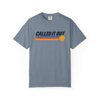 Blue-gray colored Called It Out pickleball t-shirt with bold retro lettering and yellow pickleball accent.