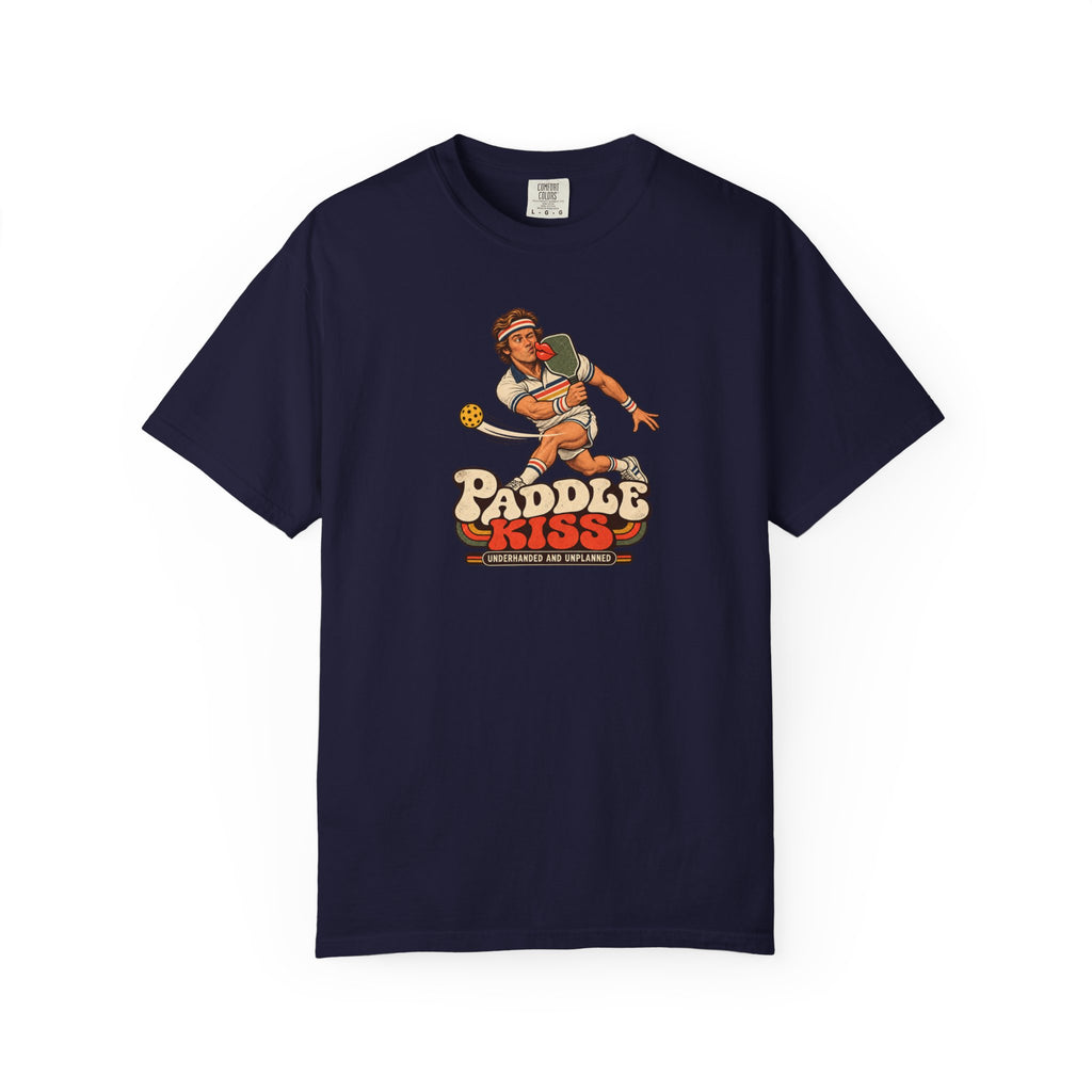 Navy colored Paddle Kiss pickleball t-shirt with playful vintage paddle-and-pickleball character graphic.
