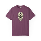 Berry colored Pickleball Skull t-shirt with skull illustration featuring perforated pickleball details.