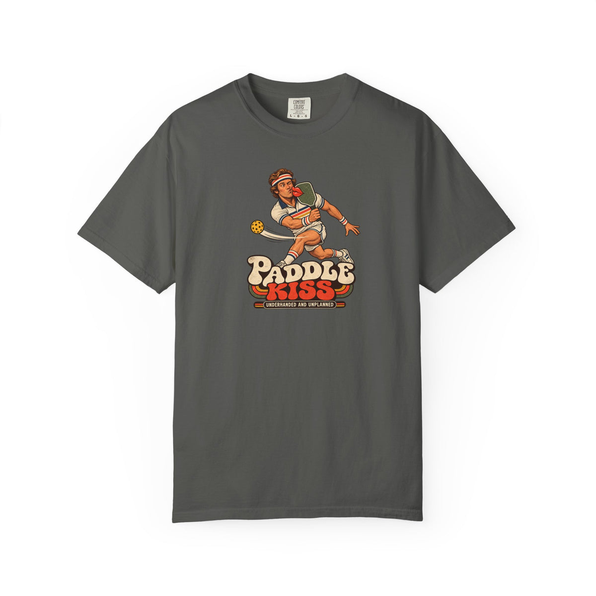 Pepper colored Paddle Kiss pickleball t-shirt with playful vintage paddle-and-pickleball character graphic.