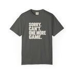 Pepper colored Sorry. Can't. One More Game. pickleball t-shirt with bold stacked cream typography.