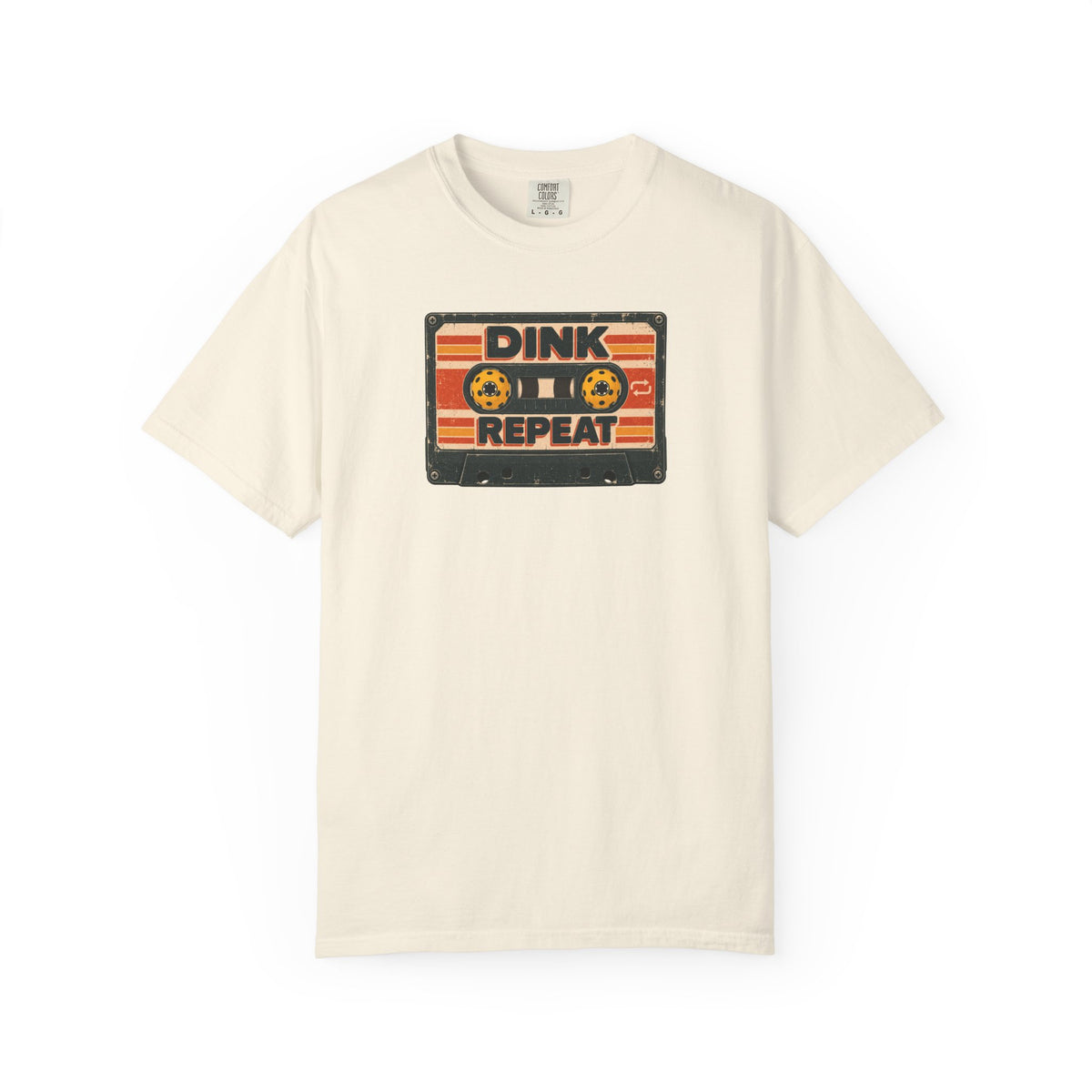 Ivory colored Dink. Repeat. pickleball t-shirt with orange-and-black retro badge-style typography.