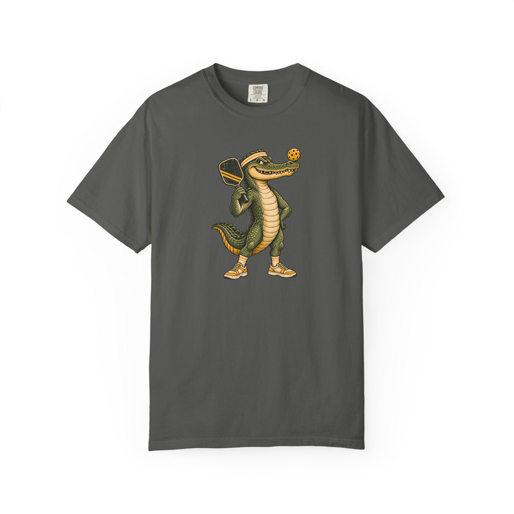 Pepper colored Pickleball Gator pickleball t-shirt with cartoon alligator player holding a paddle.