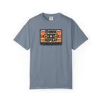 Blue-gray colored Dink. Repeat. pickleball t-shirt with orange-and-black retro badge-style typography.