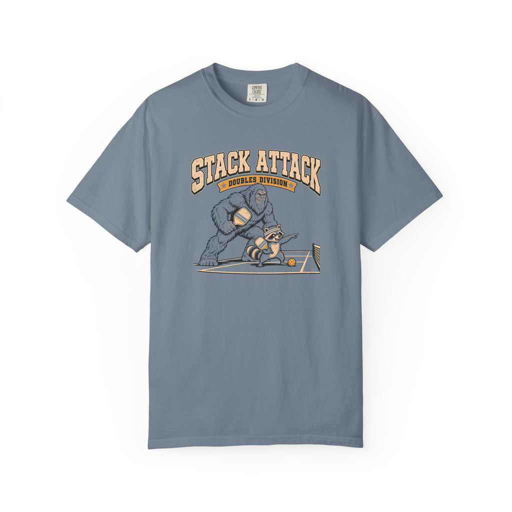 Blue-gray colored Stack Attack pickleball t-shirt with distressed cream lettering and pickleball strategy graphic.