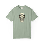 Sage colored Pickleball Skull t-shirt with skull illustration featuring perforated pickleball details.