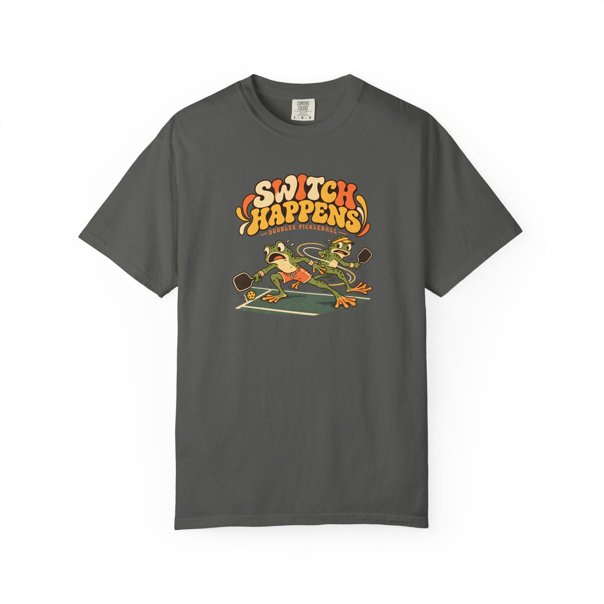 Pepper colored Switch Happens pickleball t-shirt with colorful retro court graphic and bold curved lettering.