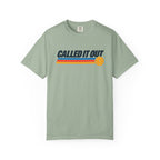 Sage colored Called It Out pickleball t-shirt with bold retro lettering and yellow pickleball accent.