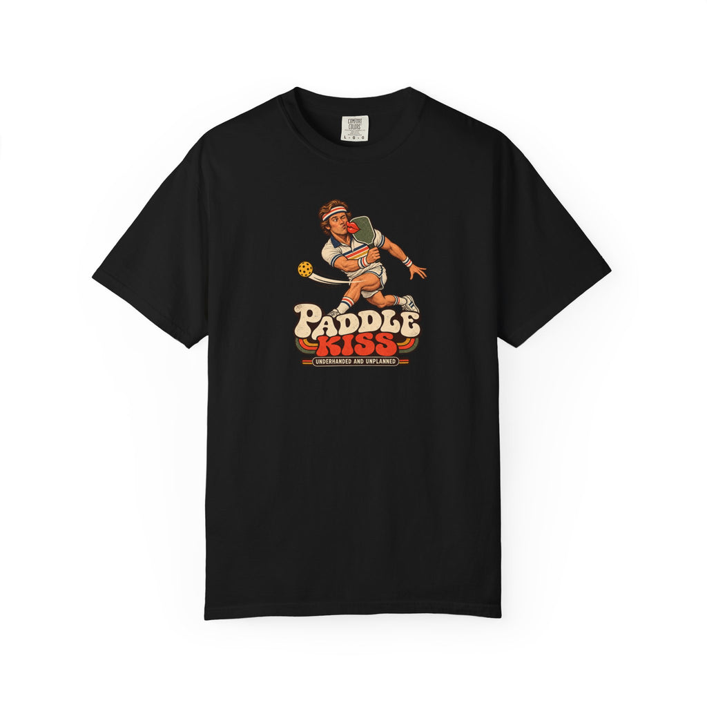 Black colored Paddle Kiss pickleball t-shirt with playful vintage paddle-and-pickleball character graphic.