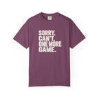 Berry colored Sorry. Can't. One More Game. pickleball t-shirt with bold stacked cream typography.