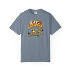 Blue-gray colored Switch Happens pickleball t-shirt with colorful retro court graphic and bold curved lettering.