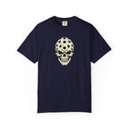Navy colored Pickleball Skull t-shirt with skull illustration featuring perforated pickleball details.