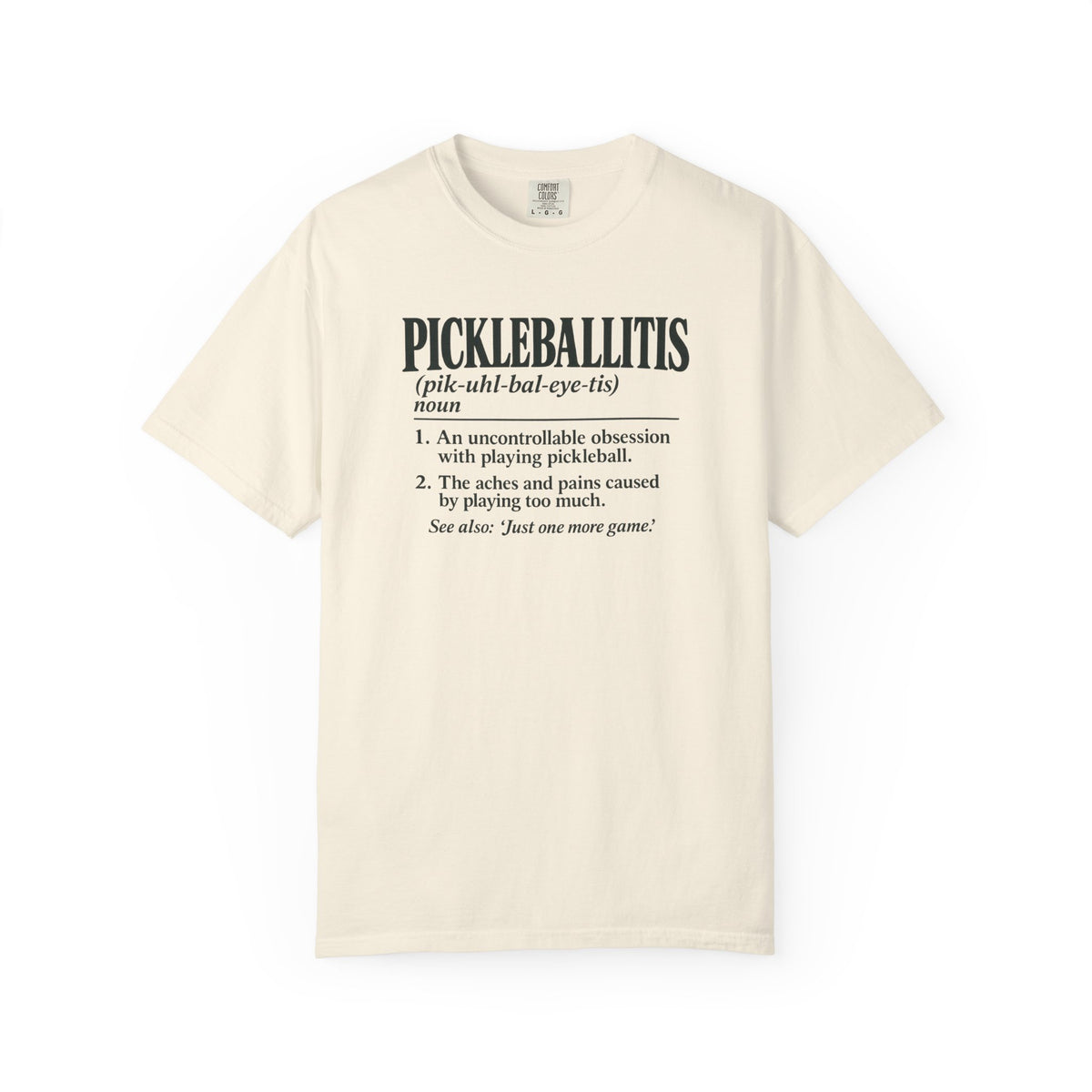 Ivory colored Pickleballitis pickleball t-shirt with dictionary-style diagnosis typography and humorous definition.