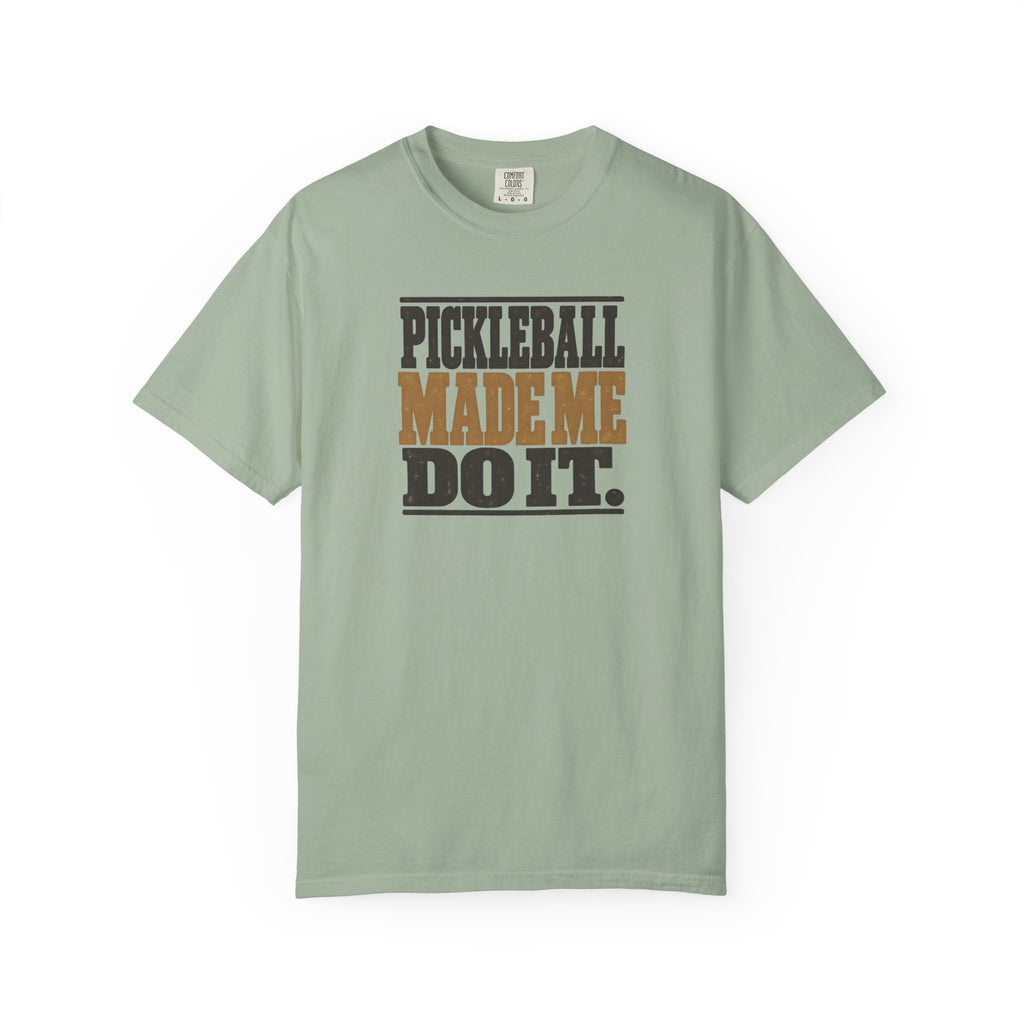 Sage colored Pickleball Made Me Do It t-shirt with bold distressed retro pickleball typography.