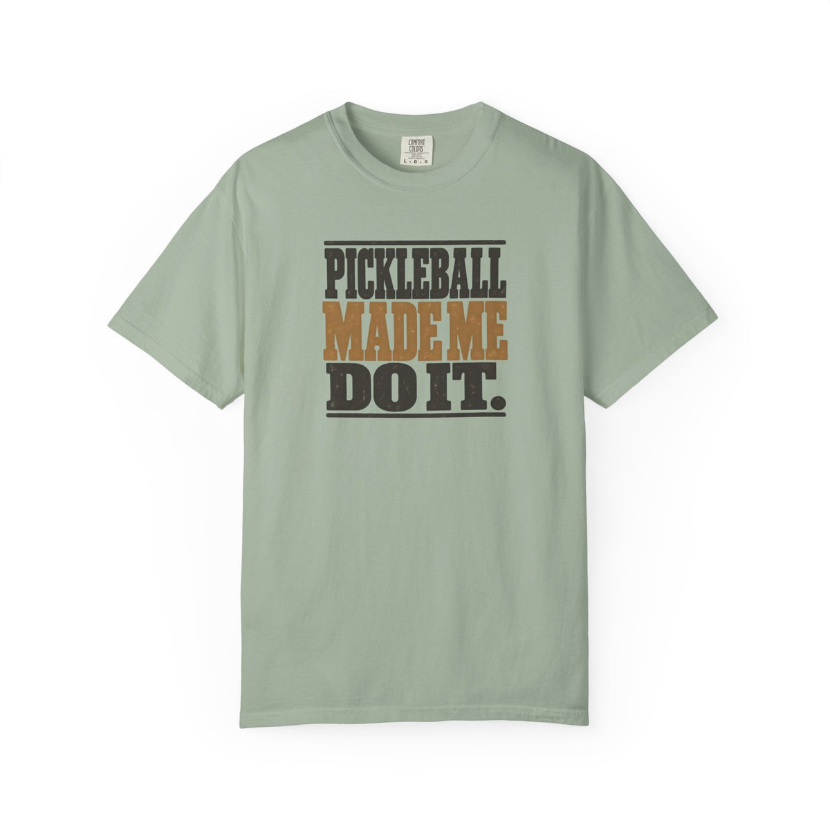 Sage colored Pickleball Made Me Do It t-shirt with bold distressed retro pickleball typography.