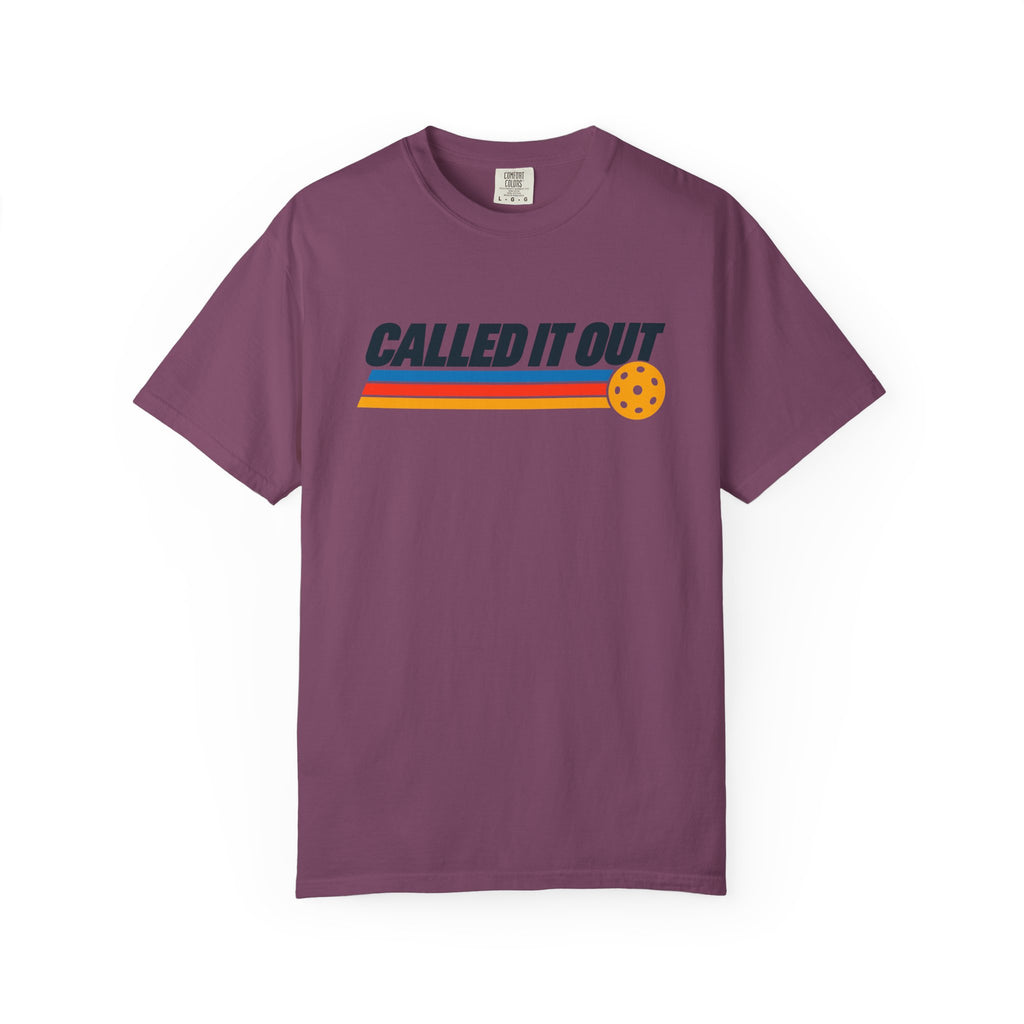 Berry colored Called It Out pickleball t-shirt with bold retro lettering and yellow pickleball accent.
