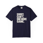Navy colored Sorry. Can't. One More Game. pickleball t-shirt with bold stacked cream typography.