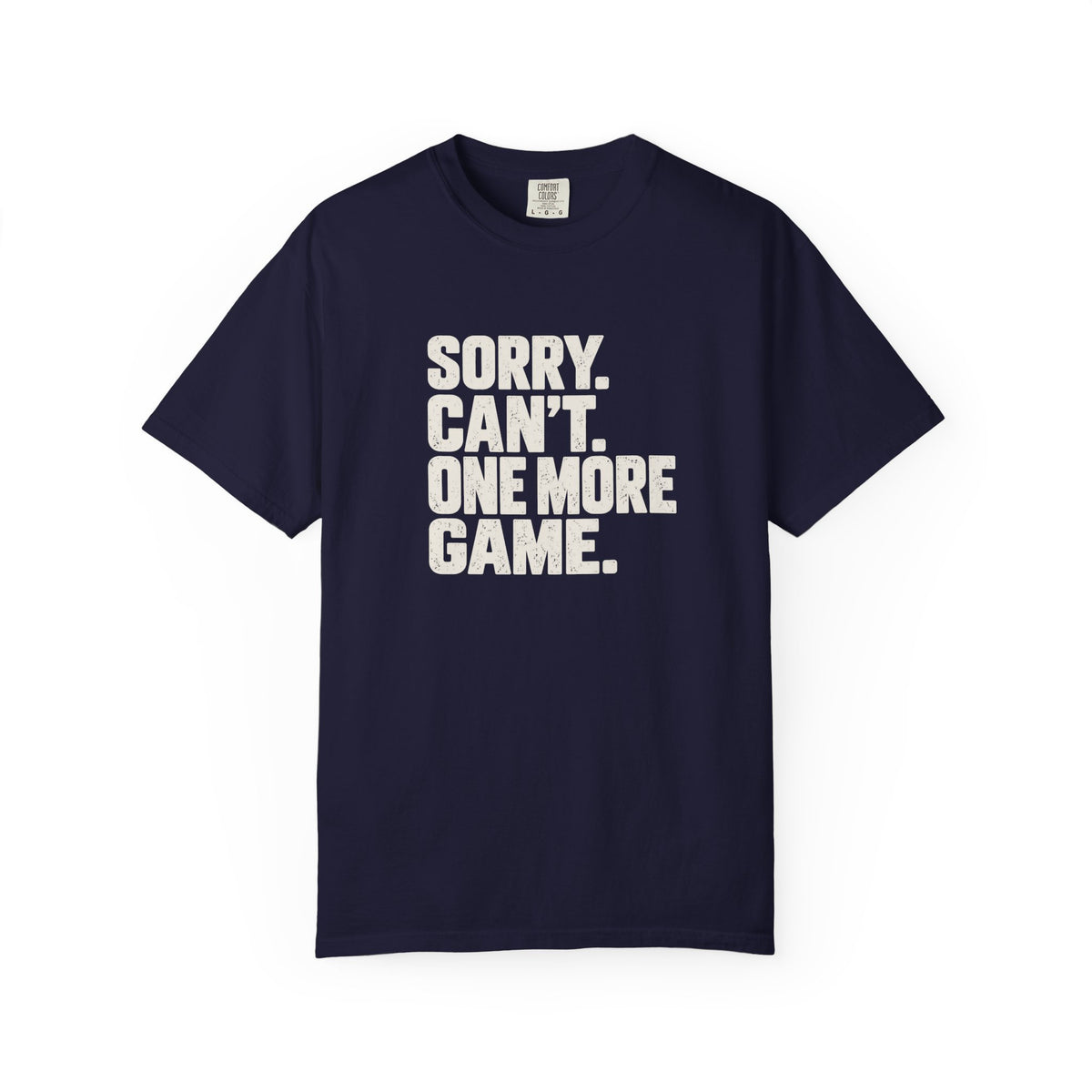 Navy colored Sorry. Can't. One More Game. pickleball t-shirt with bold stacked cream typography.