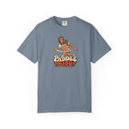 Blue-gray colored Paddle Kiss pickleball t-shirt with playful vintage paddle-and-pickleball character graphic.
