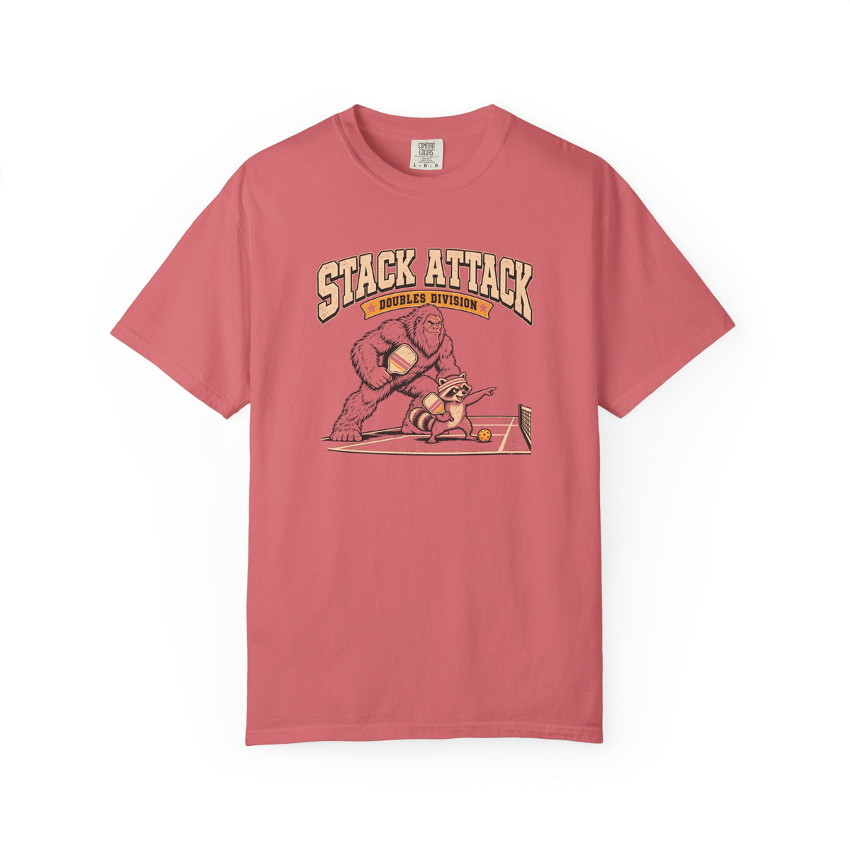 Watermelon colored Stack Attack pickleball t-shirt with distressed cream lettering and pickleball strategy graphic.