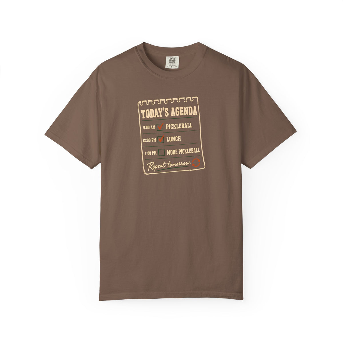 Espresso colored Today's Agenda pickleball t-shirt with framed checklist-style pickleball graphic and vintage typography.