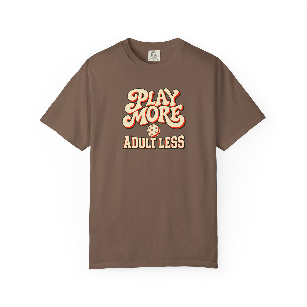 Espresso colored Play More Adult Less pickleball t-shirt with playful cream script typography.