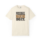 Ivory colored Pickleball Made Me Do It t-shirt with bold distressed retro pickleball typography.
