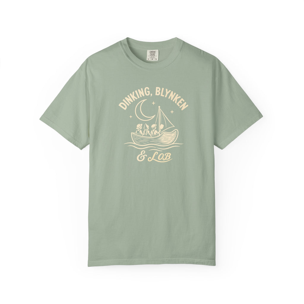 Sage colored Dinking, Blynken & Lob pickleball t-shirt with vintage moon-themed illustration and curved lettering.