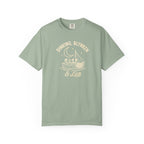 Sage colored Dinking, Blynken & Lob pickleball t-shirt with vintage moon-themed illustration and curved lettering.