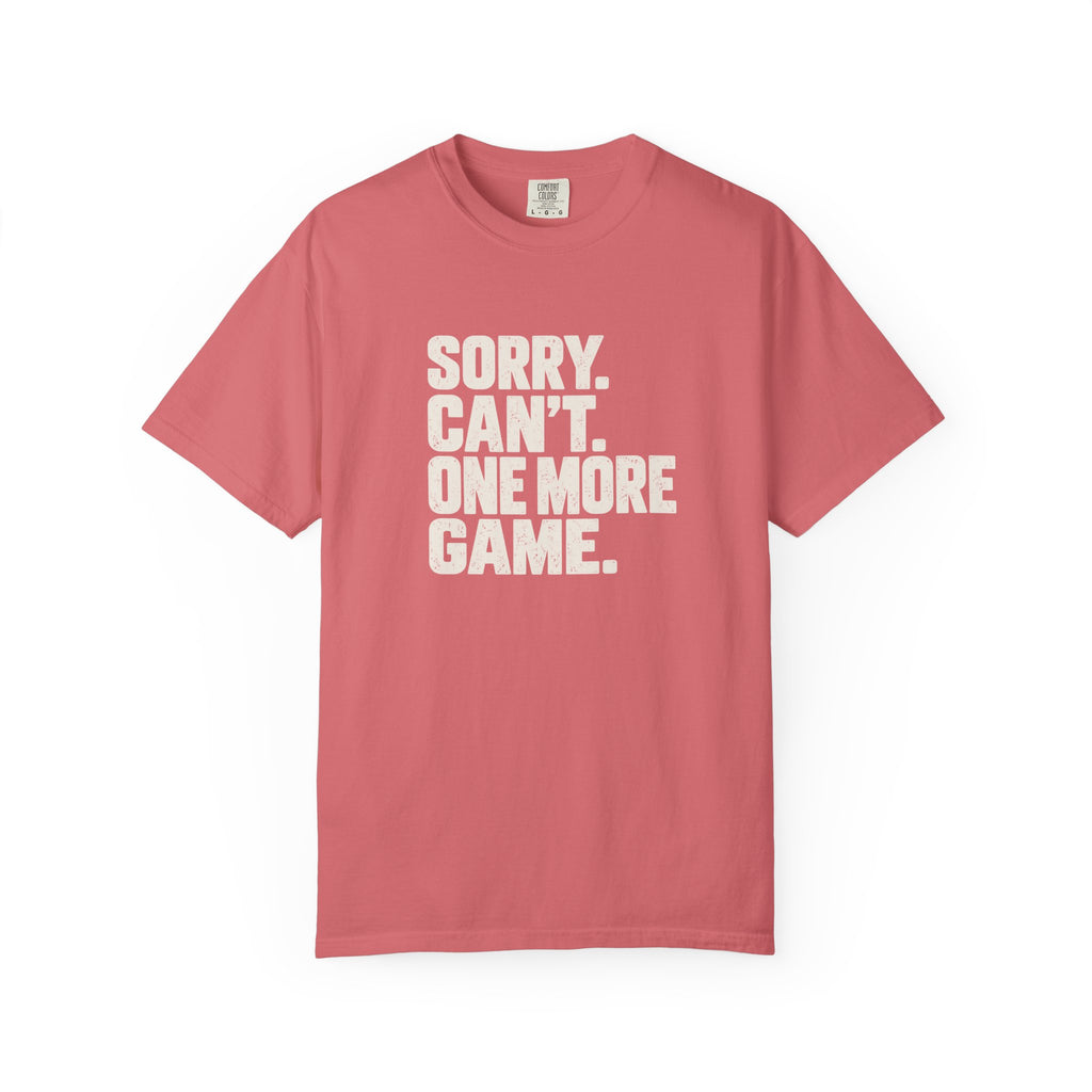 Watermelon colored Sorry. Can't. One More Game. pickleball t-shirt with bold stacked cream typography.