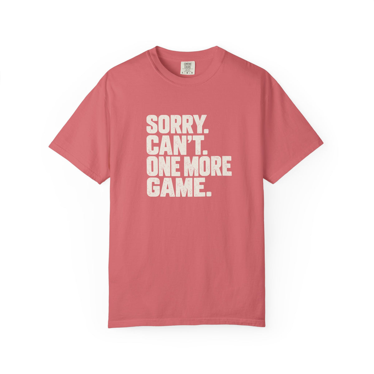 Watermelon colored Sorry. Can't. One More Game. pickleball t-shirt with bold stacked cream typography.