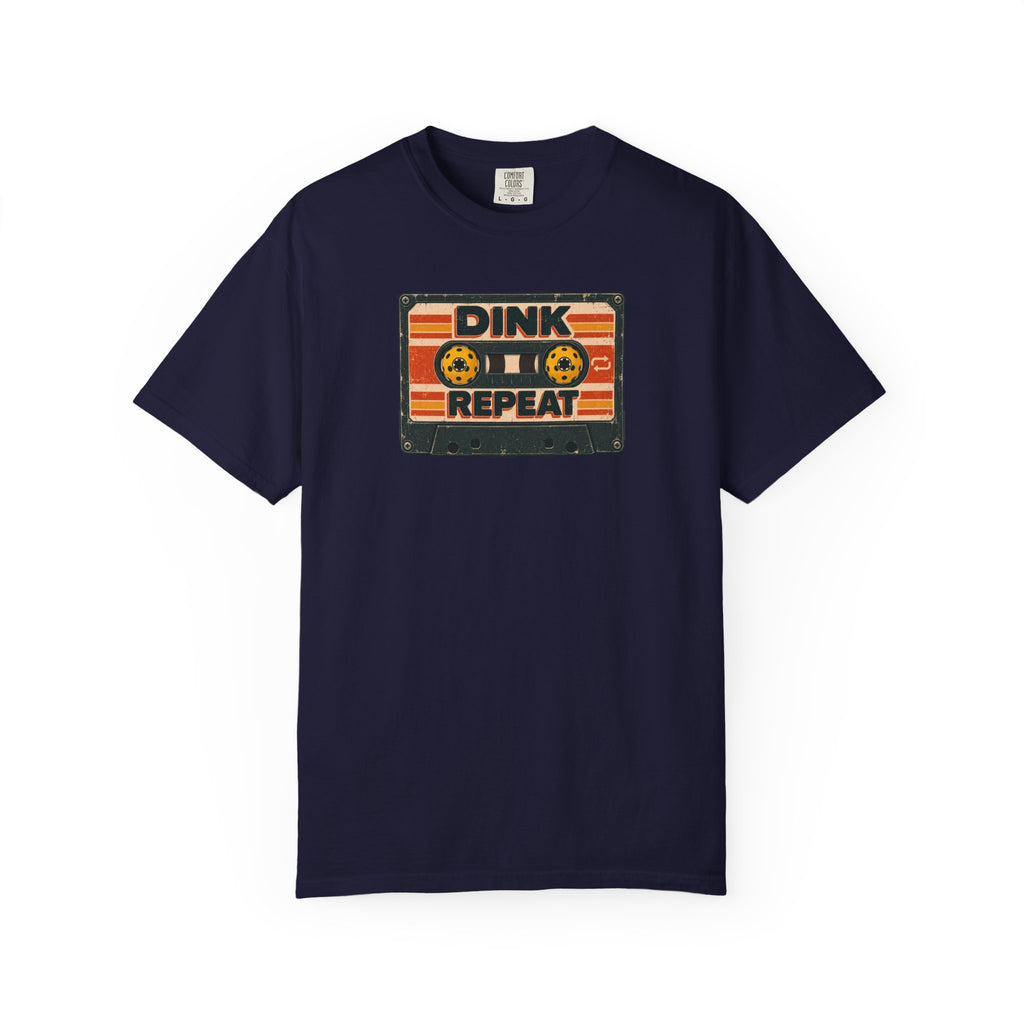 Navy colored Dink. Repeat. pickleball t-shirt with orange-and-black retro badge-style typography.