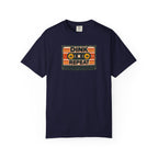 Navy colored Dink. Repeat. pickleball t-shirt with orange-and-black retro badge-style typography.