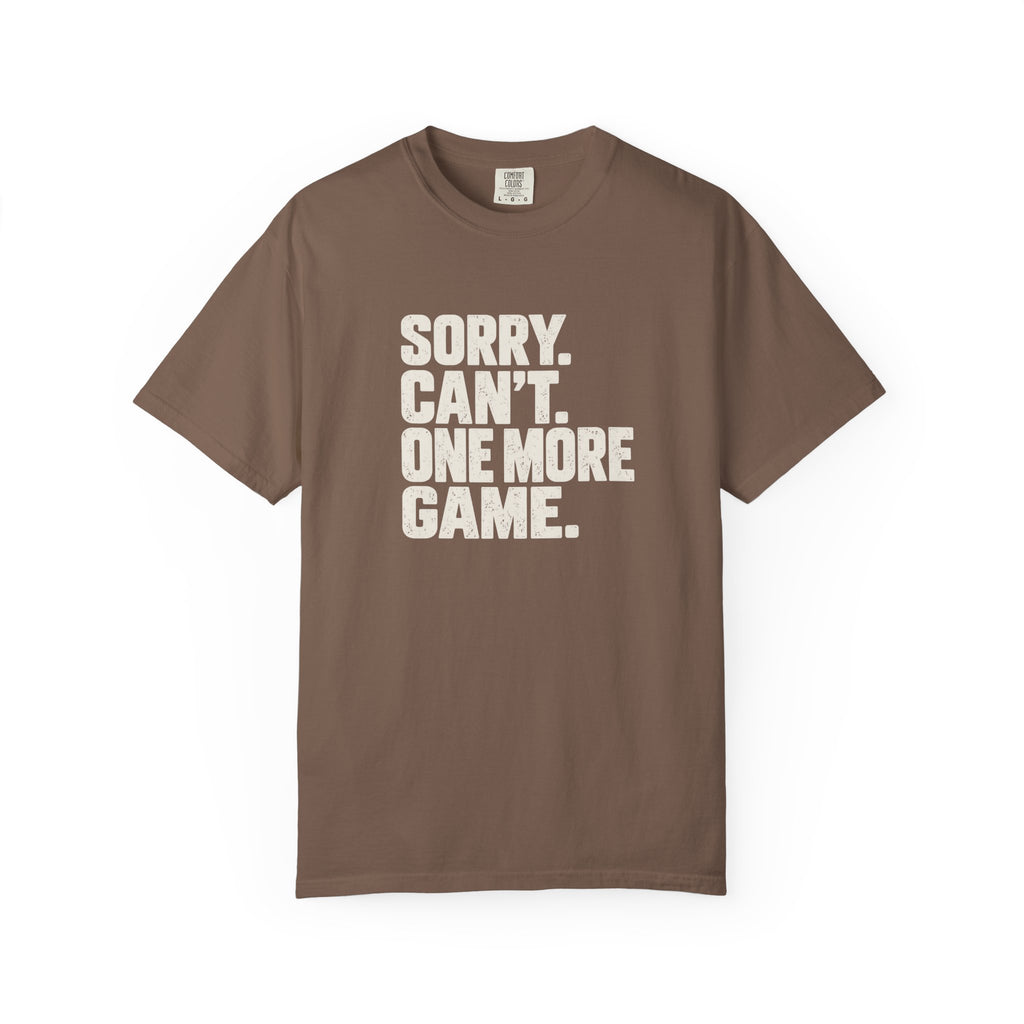 Espresso colored Sorry. Can't. One More Game. pickleball t-shirt with bold stacked cream typography.