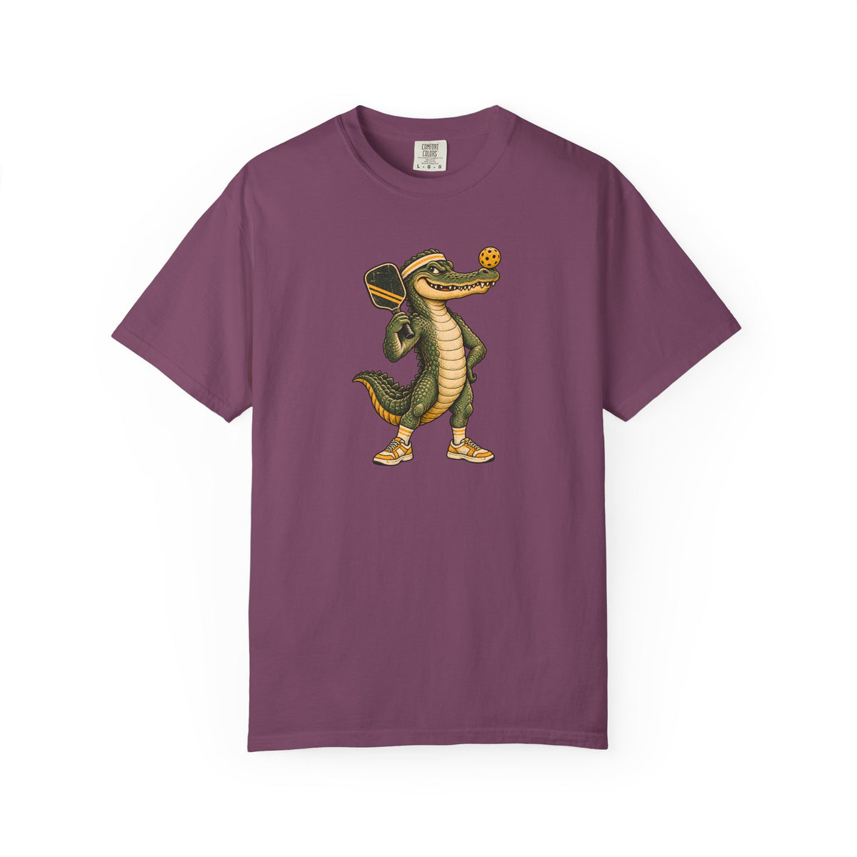 Berry colored Pickleball Gator pickleball t-shirt with cartoon alligator player holding a paddle.