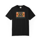 Black colored Dink. Repeat. pickleball t-shirt with orange-and-black retro badge-style typography.