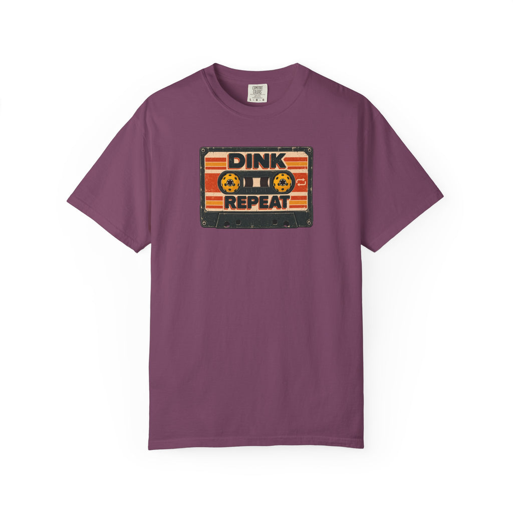 Berry colored Dink. Repeat. pickleball t-shirt with orange-and-black retro badge-style typography.