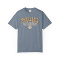 Blue-gray colored Pickleball On Repeat pickleball t-shirt with warm retro varsity-style typography.