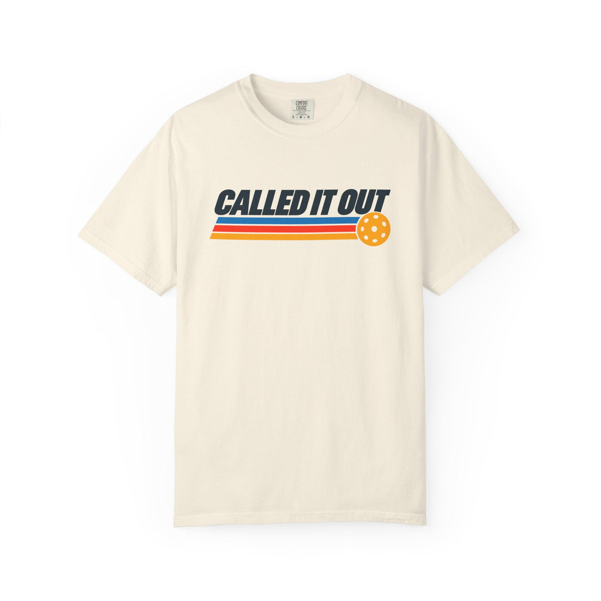 Ivory colored Called It Out pickleball t-shirt with bold retro lettering and yellow pickleball accent.