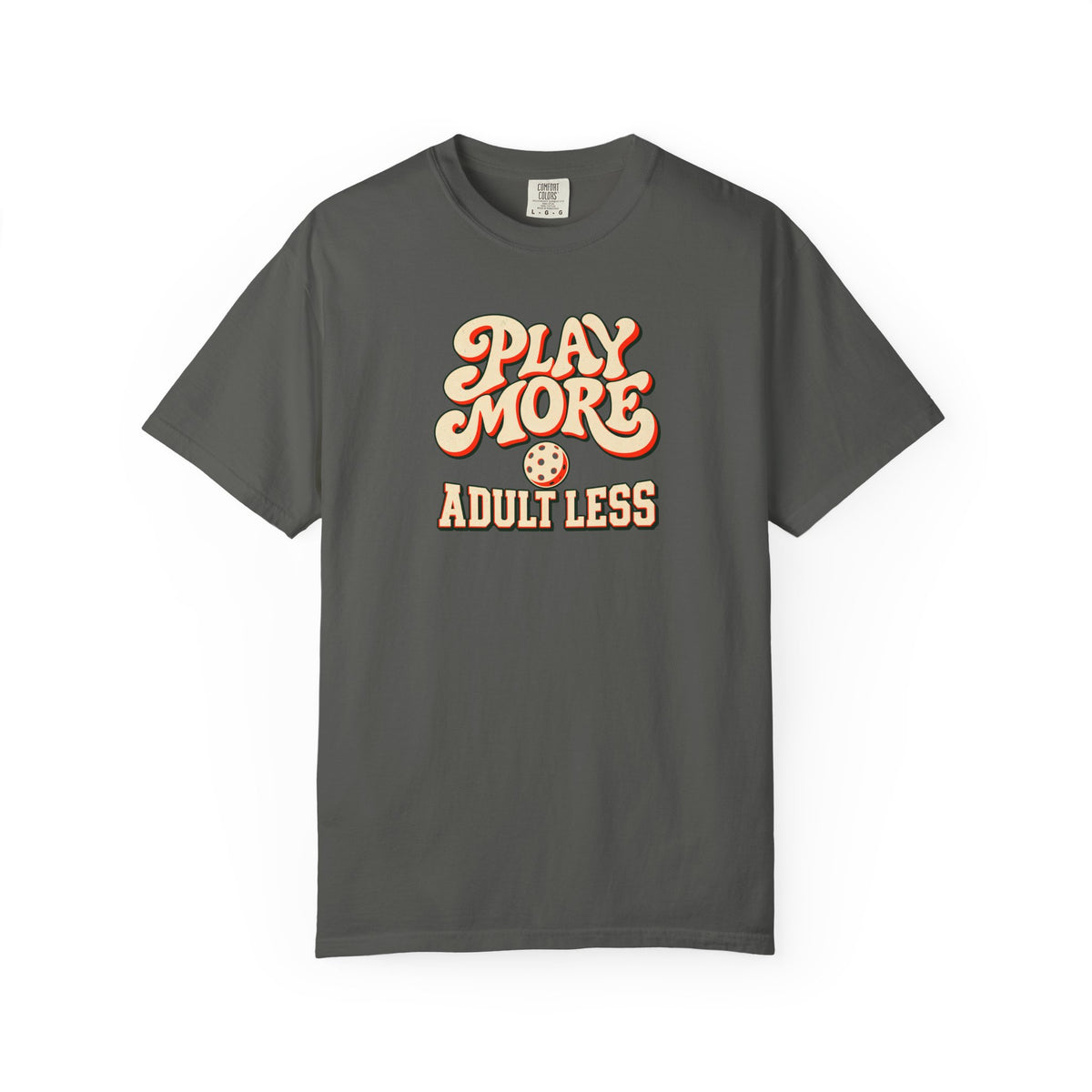 Pepper colored Play More Adult Less pickleball t-shirt with playful cream script typography.