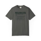 Pepper colored Pickleballitis pickleball t-shirt with dictionary-style diagnosis typography and humorous definition.