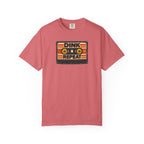 Watermelon colored Dink. Repeat. pickleball t-shirt with orange-and-black retro badge-style typography.